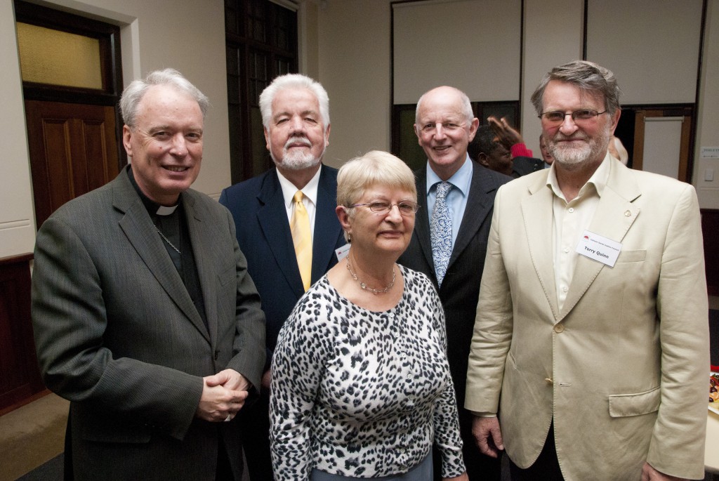 Retired former Executive Officer of the Australian Social Justice Council Terry Quinn, right, and retiring volunteer Judy Bartlett, receive the thanks and well wishes of Bishop Don Sproxton, from left, John Hollywood and Jim Smith.