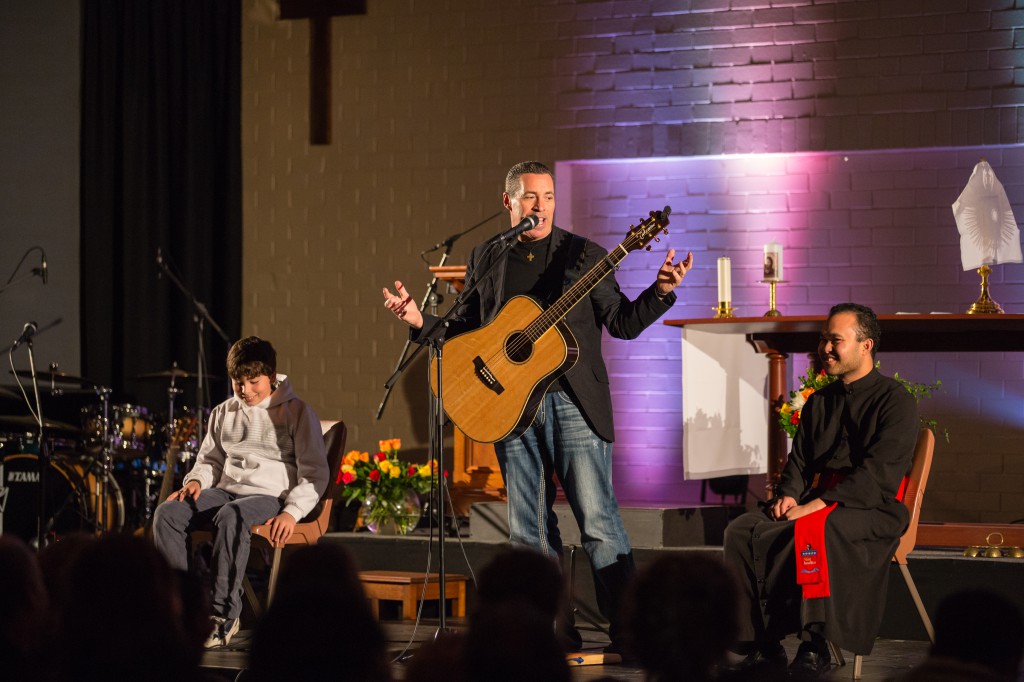 US singer-songwriter Steve Angrisano performs for Perth’s youth at Notre Dame University’s Drill Hall in Fremantle on the Feast of the Assumption.