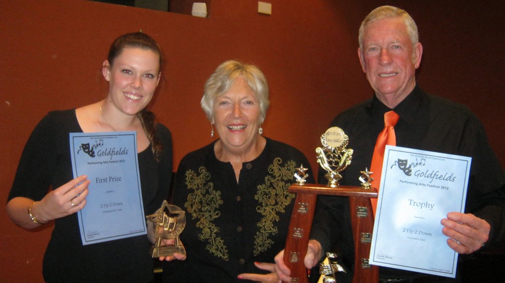 Chairman of 2Up2Down John Joyce, accepts first prize at the Goldfields Performing Arts Festival.