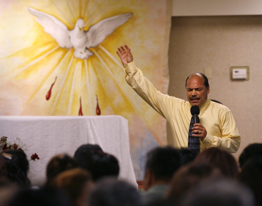 Pablo Bayona preaches during the Hispanic program at the 40th national Catholic charismatic renewal conference on June 23 in Secaucus, N.J.