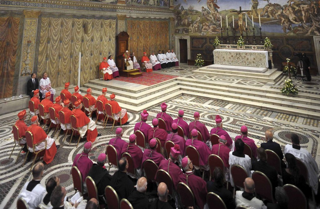 Pope Benedict XVI leads a prayer service in the Sistine Chapel at the Vatican on October 31. The service marked the 500th anniversary of the prayer service led by Pope Julius II in 1512 to celebrate Michelangelo’s completion of the ceiling paintings. PHOTO: l’osservatore romano via reuters, CNS