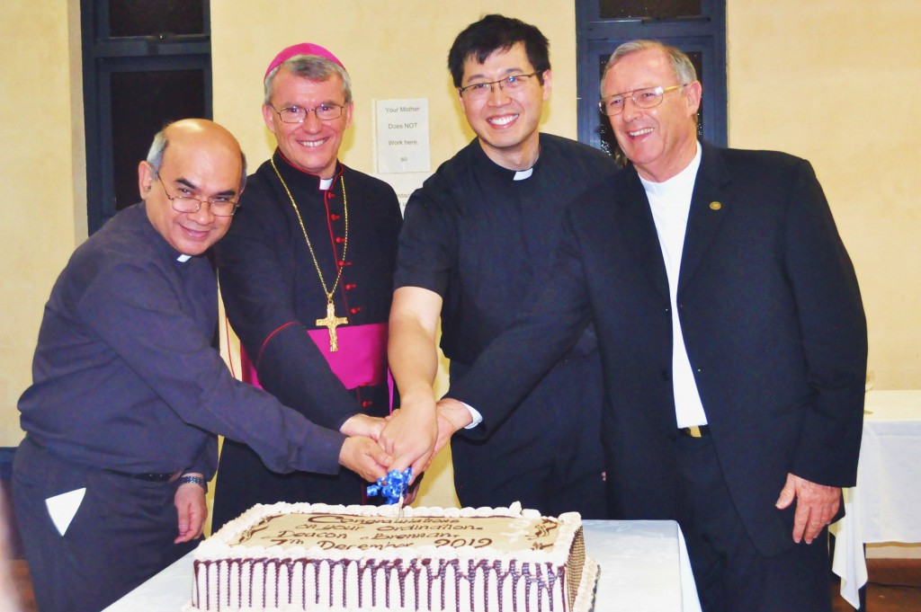 Happy Deacon Brennan Kee-Ong Sia, second from right, joins Archbishop Timothy Costelloe SDB and priests from throughout the Archdioces of Perth in celebrating his ordination to the diaconate.