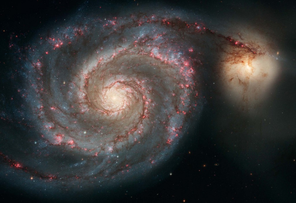 The Whirlpool galaxy and the Companion galaxy are seen in this image taken by the Hubble Space Telescope. Recent discoveries now mean science has to acknowledge the universe had a beginning, says philosopher Fr Spitzer, a Jesuit. Problem for atheists: that means a creator too.