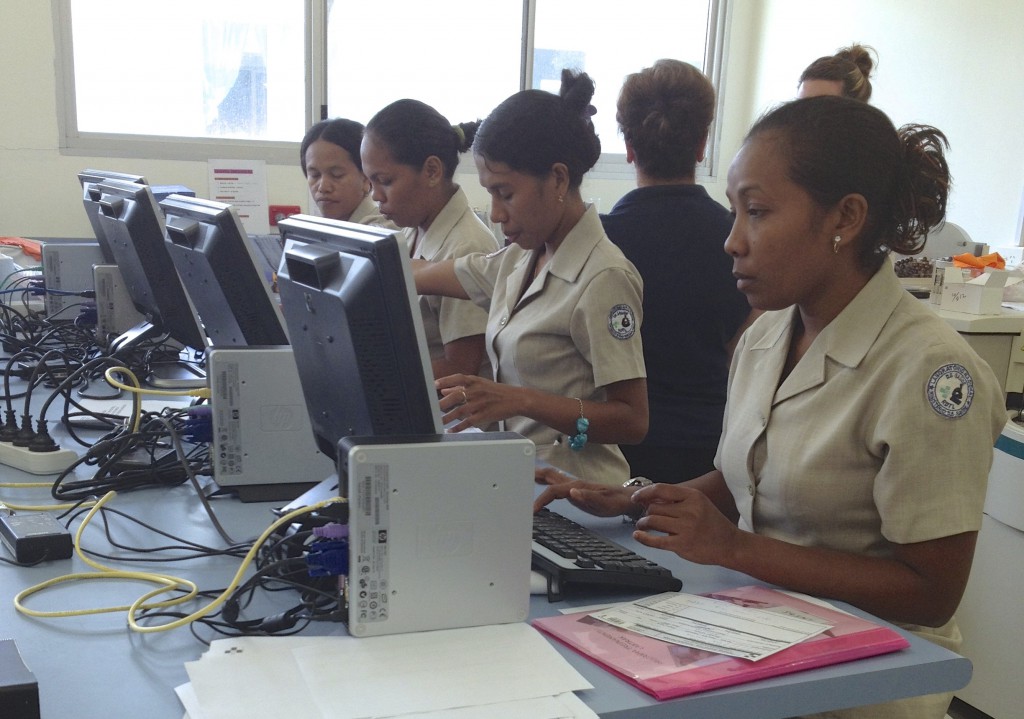 East Timor hospital staff learn to use the new information streamlining system, LabTRAK. PHOTO: Courtesy SJOG