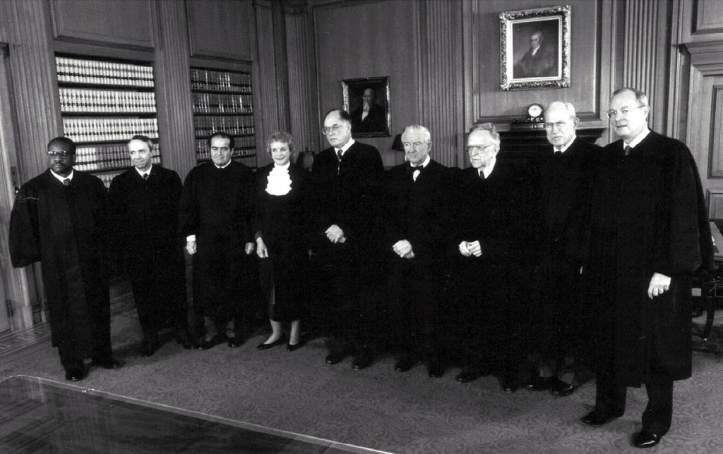 Retired Supreme Court Justice Byron White, second from right, poses in this 1991 with the U.S. Supreme Court justices. PHOTO: CNS