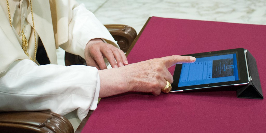 Pope Benedict XVI posts his first tweet on his Twitter account @Pontifex Dec. 12 in Paul VI hall at the Vatican. PHOTO: CNS/L 'Osservatore Romano via Reuters