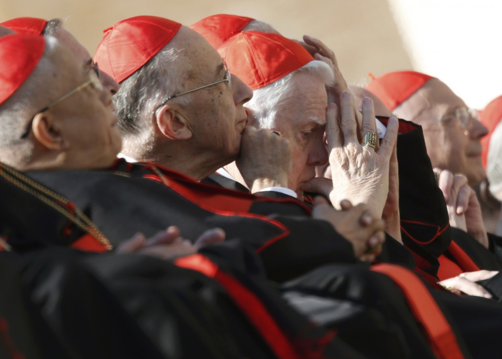 Retired U.S. Cardinal Bernard F. Law, former archbishop of Boston, sits with other cardinals before the start of Pope Benedict XVI's final general audience on Feb. 27 in St. Peter's Square at the Vatican. PHOTO: CNS/Alessandro Bianchi, Reuters