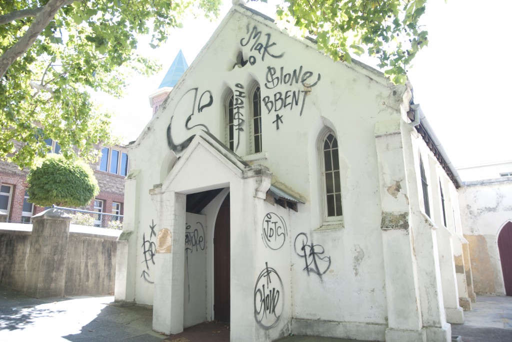 History Vandalised: St John’s Pro-Cathedral in Victoria Avenue in Perth’s central business district covered in graffiti on Monday morning this week. Photo: Matthew Biddle