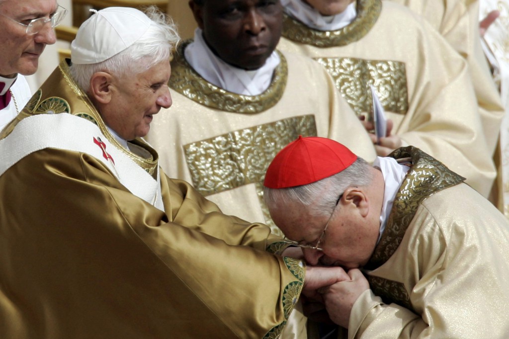 Italian Cardinal Angelo Sodano kisses the ring of Pope Benedict XVI during the pope's inaugural Masson April 24 2005 in St. Peter's Square. PHOTO: CNS/Catholic Press