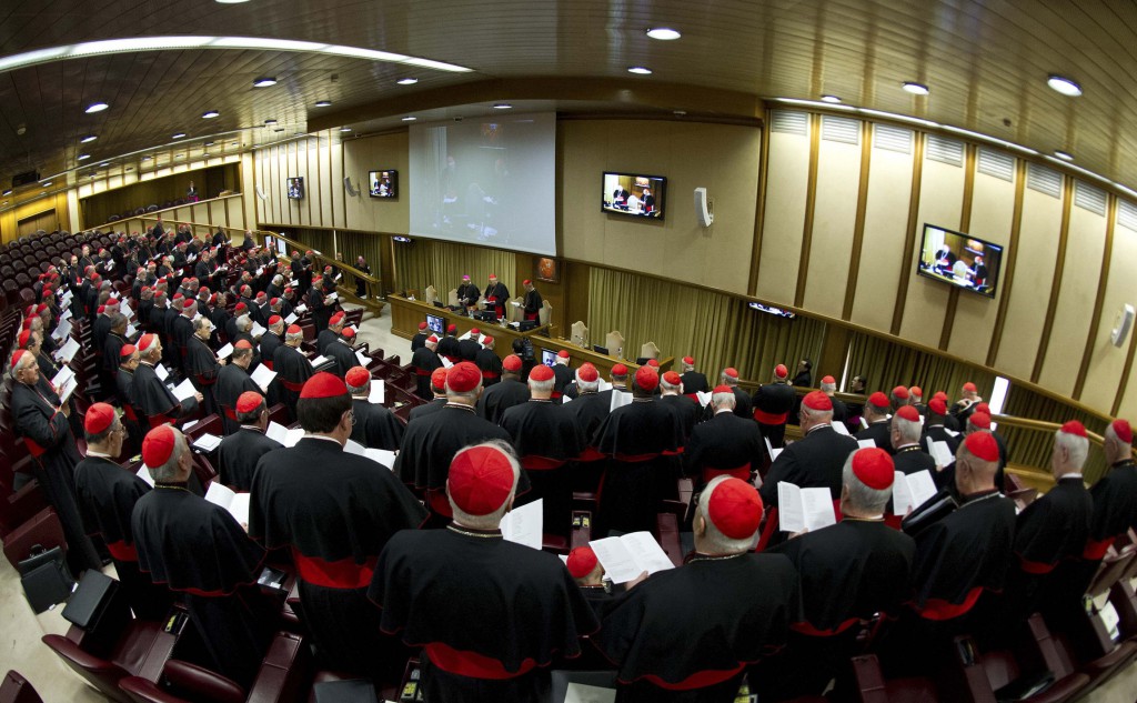 Cardinals attend a meeting at the synod hall in the Vatican on March 4 as preparations for electing a new pope began as the College of Cardinals met. PHOTO: CNS/L'Osservatore Romano Via Reuters