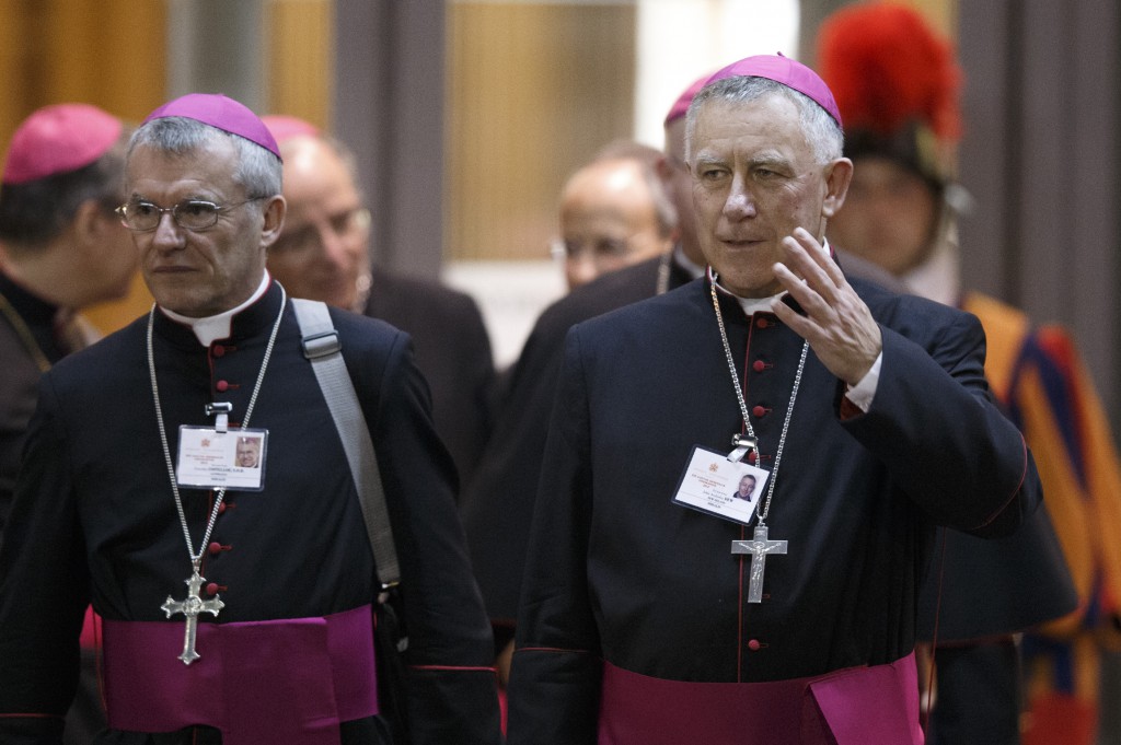 Archbishop John Dew of Wellington, New Zealand is pictured with Archbishop Timothy Costelloe of Perth, Australia leaving a meeting of the Synod of Bishops on the new evangelization in October 2012 at the Vatican. PHOTO: CNS/Paul Haring