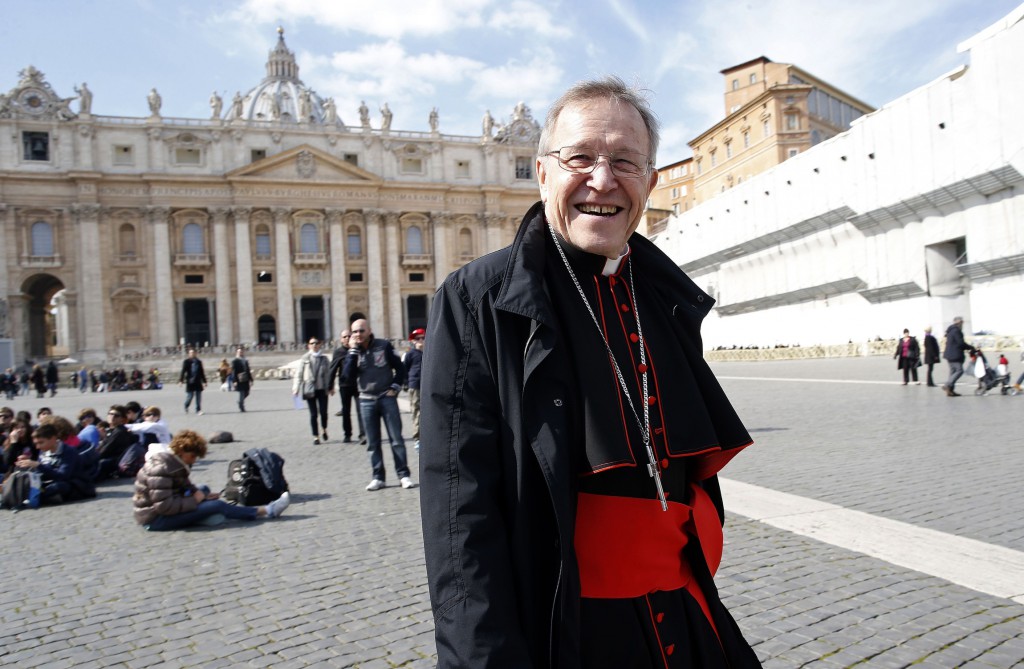 German Cardinal Walter Kasper walks smiles in St. Peters Square on March 4, after the first day the College of Cardinals met to begin the process of electing a new pope. PHOTO: CNS/Tony Gentile, Reuters