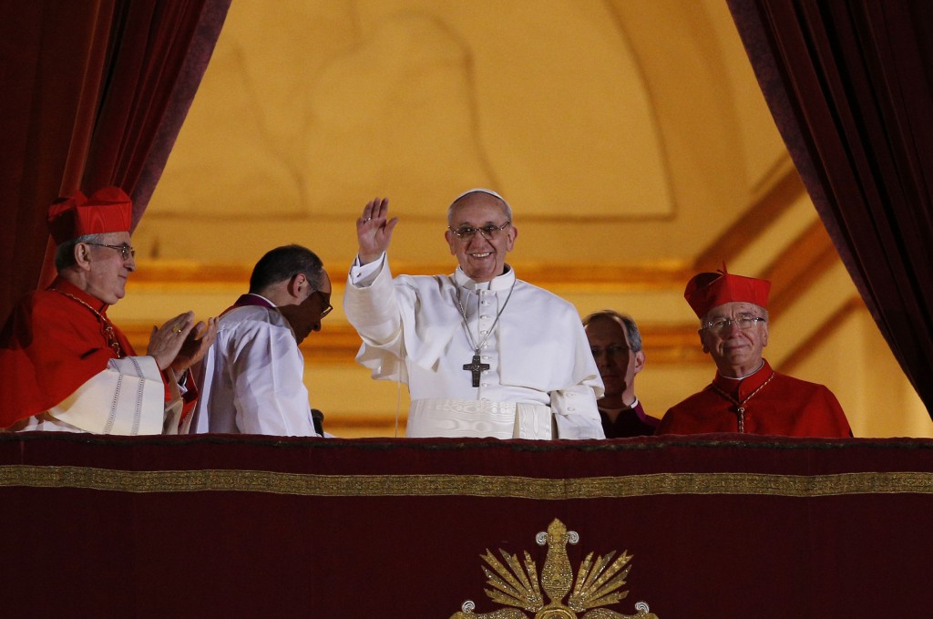 Pope Francis is pictured on March 13 appearing for the first time on the central balcony of St. Peter's Basilica at the Vatican when he was elected the 266th Roman Catholic pontiff. PHOTO: CNS/Paul Haring