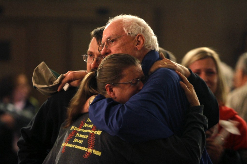 Residents embrace after taking part in a candlelight vigil April 18 at the Church of the Assumption in West, Texas, in remembrance of those who lost their lives or were injured in the massive explosion at the area's fertilizer plant. PHOTO: CNS/Jaime R. Carrero, Reuters