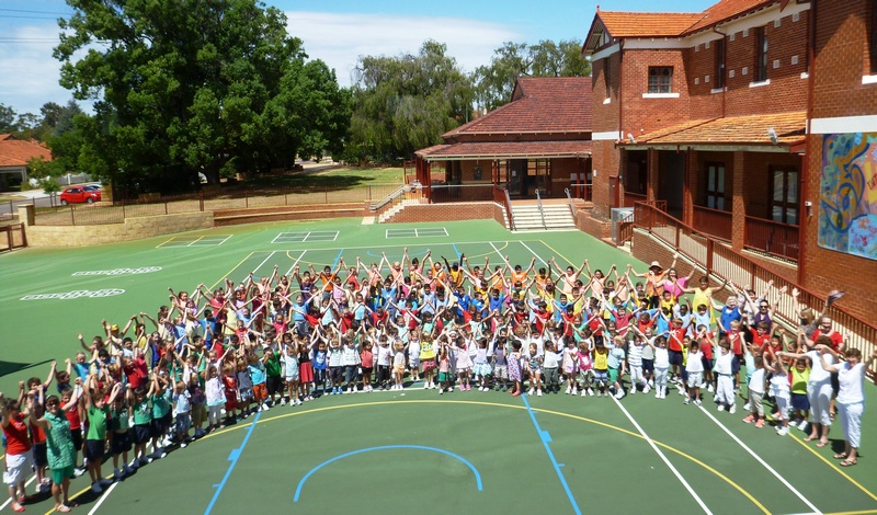 The photo that won the City of Stirling’s competition: students dressed in colours of the rainbow and holding hands for Harmony Day. PHOTO: Joanna Noonan