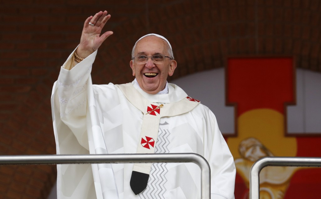 Pope Francis waves from the Basilica of the National Shrine of Our Lady of Aparecida on July 24 in Brazil. Pope Francis appointed Msgr. Leo Cushley to be the new archbishop of St. Andrews and Edinburgh, Scotland. PHOTO: CNS/Stefano Rellandini, Reuters