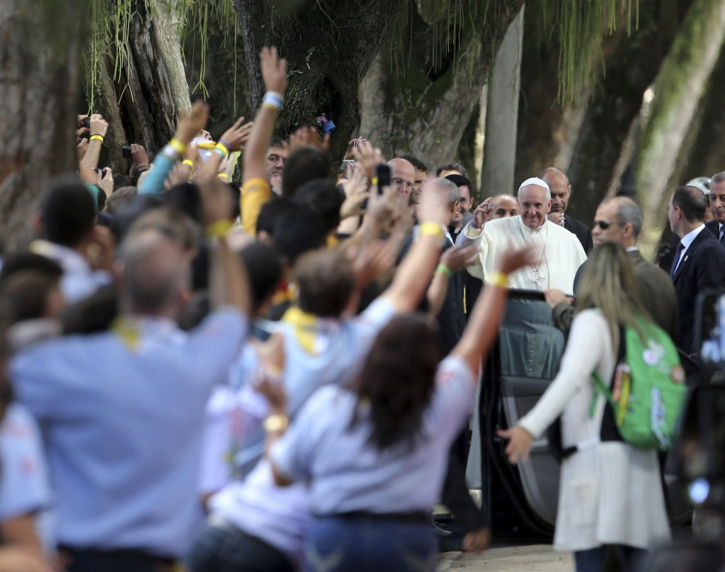 Pope Francis arrives at  Quinta da Boa Vista park, where he heard the confessions of five young people attending World Youth Day, July 26 in Rio de Janeiro. PHOTO: CNS/Paulo Whitaker, Reuters