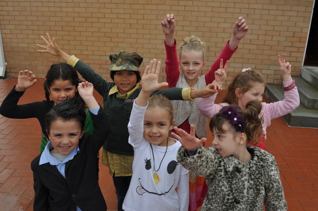 Children from St Columba’s Primary, Bayswater wearing clothing from St Vincent de Paul on the school’s inaugural Vinnies Day. PHOTO: St Columba’s