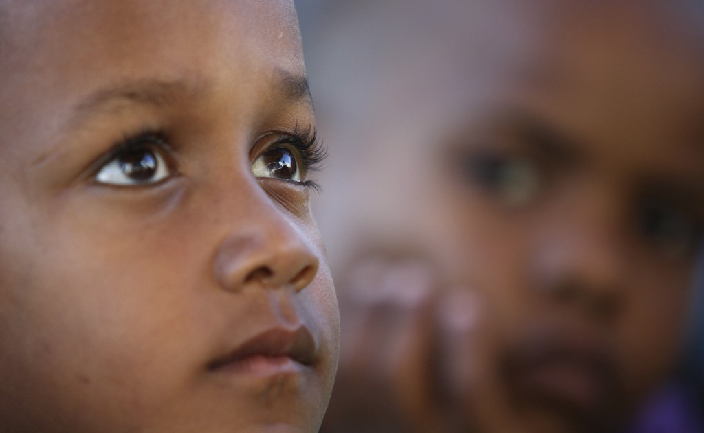 A Libyan boy looks on during celebrations of World Refugee Day in 2012 at a UN refugee camp in Benghazi, Libya.Photo: CNS/Esam Al-Fetori, Reuters