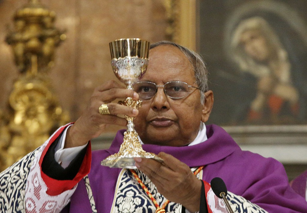 Sri Lankan Cardinal Albert Malcolm Ranjith of Colombo celebrates Mass at the Church of San Lorenzo In Lucino March 10 in Rome. Cardinal Ranjith said at the funeral of Ravishan Perera, a victim of the shooting, "It was sacrilege for anyone to enter such sacred precincts with arms in their hands and to behave in a violent manner there." PHOTO: CNS/Chris Helgren, Reuters