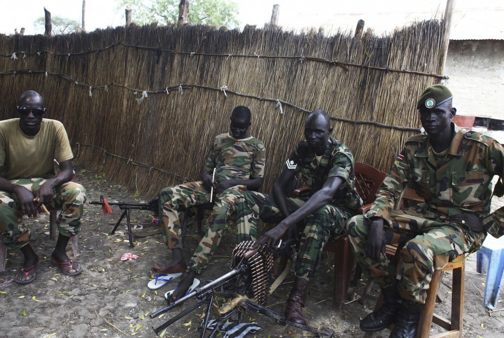 Members of the Sudan People's Liberation Army are seen at an unidentified location in Pibor, in South Sudan's Jonglei  state, July 18. A committee of religious and civic leaders said foreign governments and political interests within South Sudan were supporting a Jonglei rebel leader in an effort to destabilize the young nation. PHOTO: CNS/Andreea Campeanu, Reuters