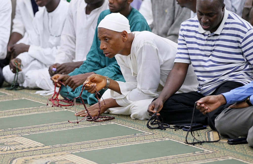 Muslims take part in prayers during the I'tikaf, a spiritual retreat on July 31 in a mosque that is usually held during the last 10 days of Ramadan, at the Sanusi Dantata Memorial Jummu'at mosque in Abuja, Nigeria. PHOTO: CNS/Afolabi Sotunde, Reuters