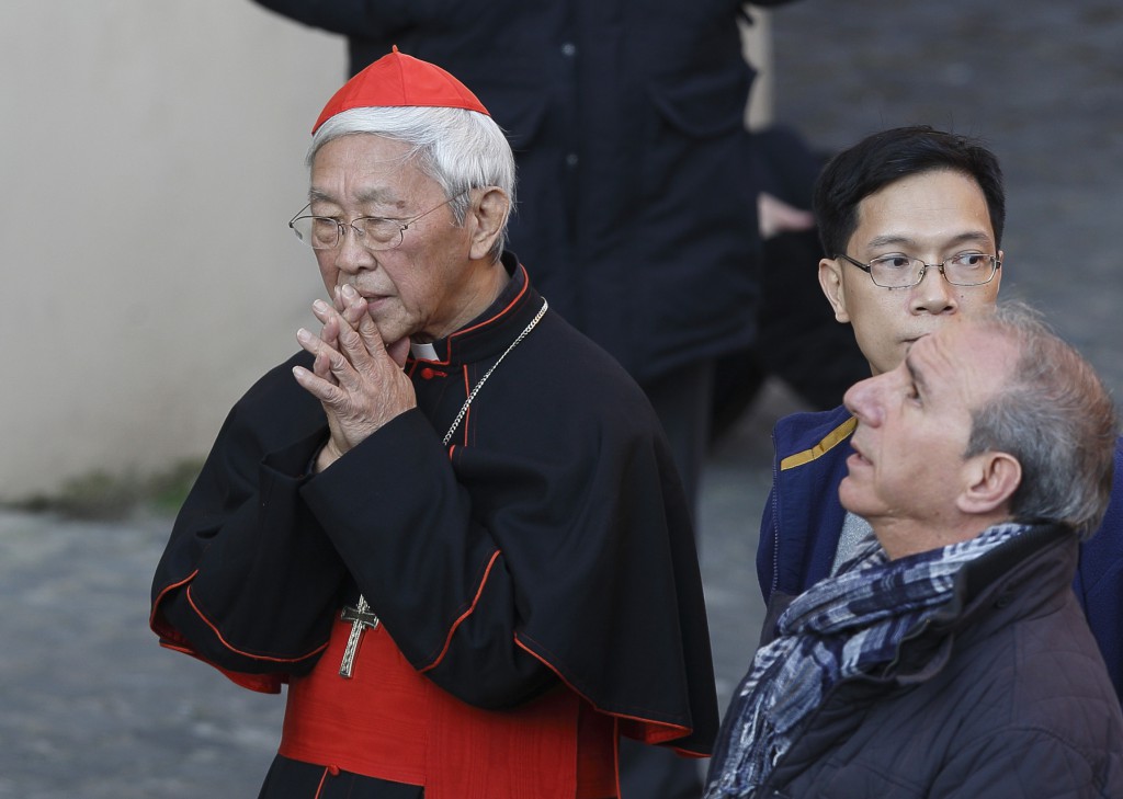 Cardinal Joseph Zen Ze-kiun, retired archbishop of Hong Kong, prays before Pope Benedict XVI's final public appearance as pope at Castel Gandolfo, Italy, Feb. 28. The Asian church news portal ucanews.com reported that Cardinal Joseph Zen Ze-kiun issued the request for a symbolic mooncake donation to prisoners in Hong Kong to Pope Francis in August. PHOTO: CNS/Paul Haring