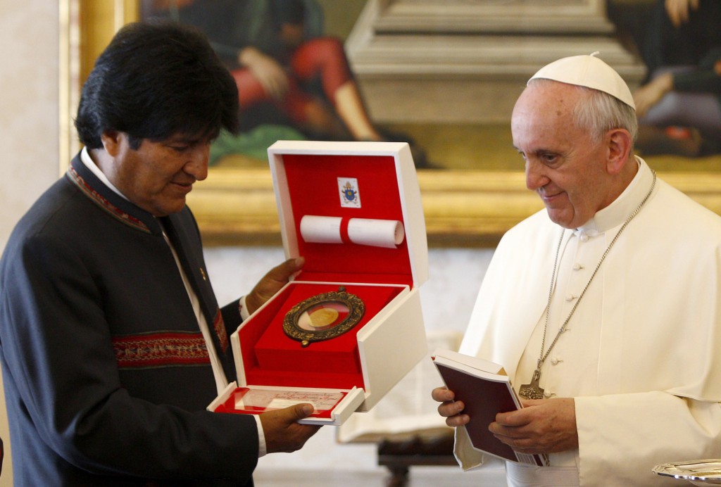 Pope Francis exchanges gift on Sept. 6 with Bolivian President Evo Morales during a private audience at the Vatican. PHOTO: CNS/Riccardo De Luca, pool via Reuters
