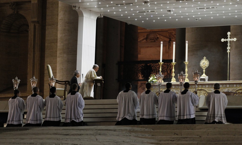 Pope Francis prays before the Eucharist during a vigil to pray for peace in Syria Sept. 7 in St. Peter's Square at the Vatican. PHOTO: CNS/Paul Haring