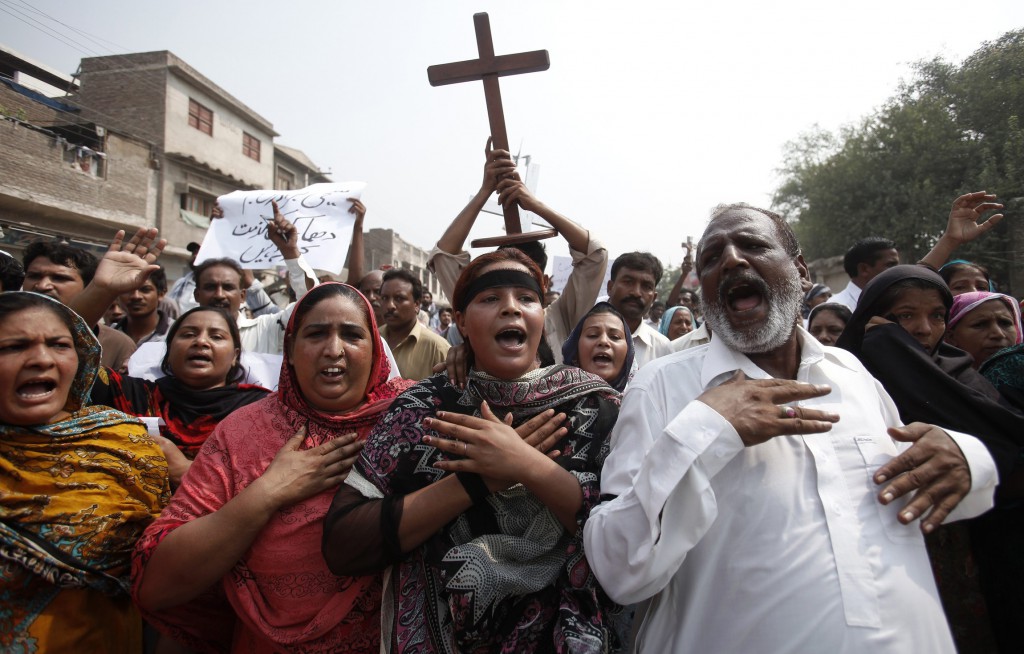 Members of the Pakistani Christian community chant slogans during a Sept. 23 protest rally to condemn the suicide attack on All Saints Church in Peshawar the previous day. At least 81 people were killed by two suicide bombers outside the historic church in Peshawar, prompting countrywide protests by Christians who condemned authorities for failing to protect minorities. PHOTO: CNS/Fayaz Aziz, Reuters