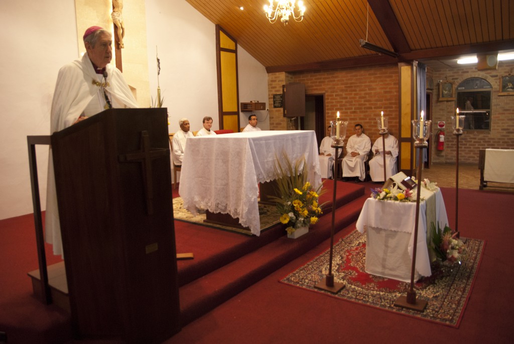 With the relics of three saints on display for veneration in the background, Archbishop Emeritus Barry Hickey leads Vespers at Good Shepherd Parish Church last Saturday. The service was attended by the very young through to the very old. PHOTO: Peter Rosengren