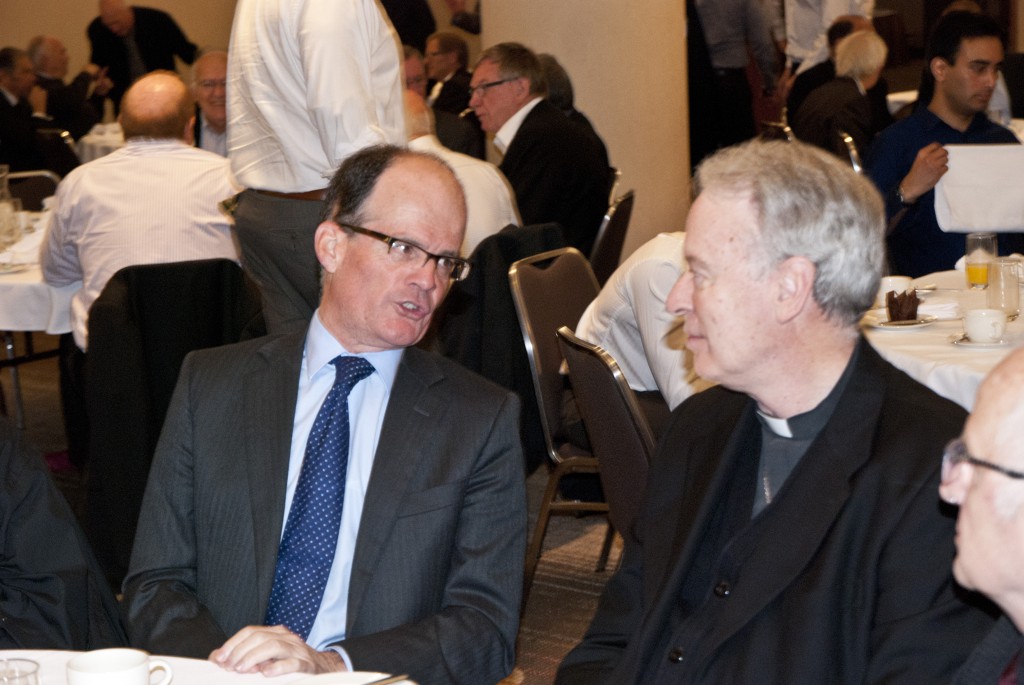 Justice Robert Mazza, this month’s MenAlive breakfast speaker enjoying conversation over breakfast with Bishop Donald Sproxton. PHOTO: Mark Reidy