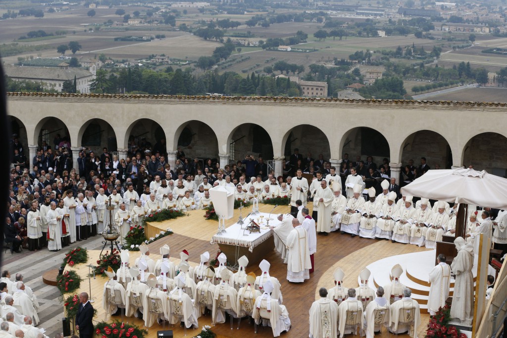 Pope Francis celebrates Mass on Oct. 4 in the piazza outside the Basilica of St. Francis in Assisi, Italy. PHOTO: CNS/Paul Haring