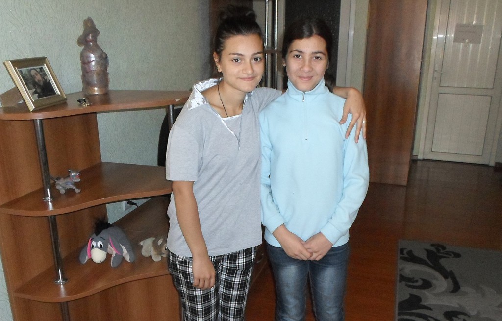 Darina Eradze, 17, and Natia, 12, pictured in an Oct. 5 photo, are among the 50 Georgian girls and boys without parents who live in Caritas-run family-oriented homes in the country’s capital, Tbilisi. PHOTO: CNS/James Martone