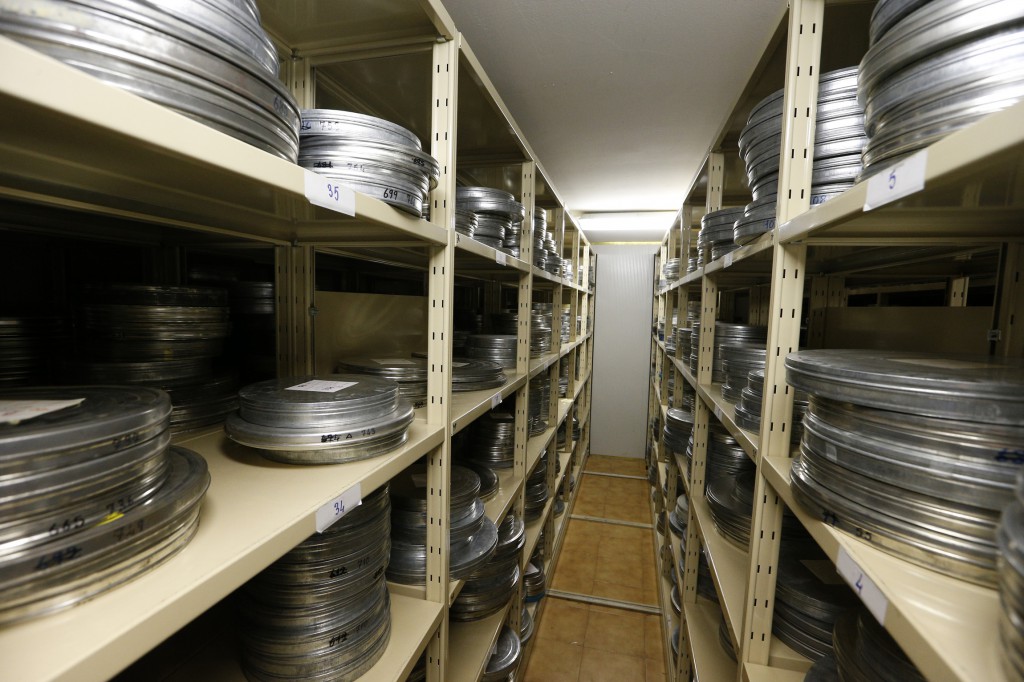 Film reels are seen in a climate-controlled storage library of the Pontifical Council for Social Communications at the Vatican Oct. 10. The Vatican has a collection of more than 8,000 films, the oldest an 1896 short reel of Pope Leo XIII. PHOTO: CNS/Paul Haring