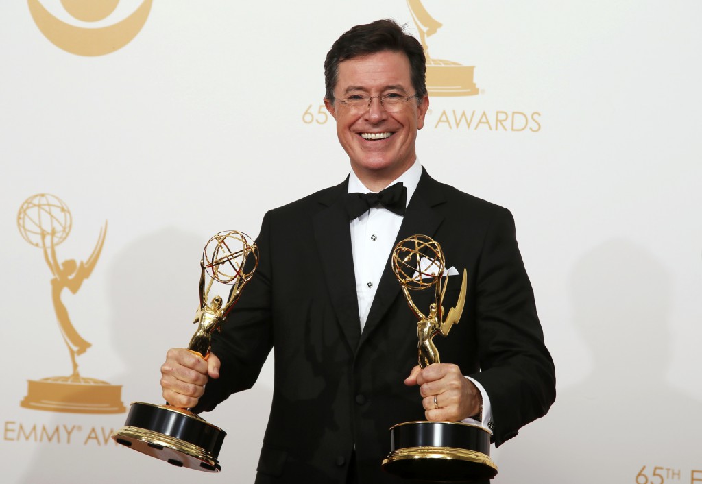 Stephen Colbert of Comedy Central's "The Colbert Report" poses with his Emmys during the Academy of Television Arts & Sciences awards show in Los Angeles in September. The Catholic comedian headlined the 68th annual dinner of the Alfred E. Smith Memorial Foundation Oct. 17 in New York. PHOTO: CNS/Lucy Nicholson, Reuters