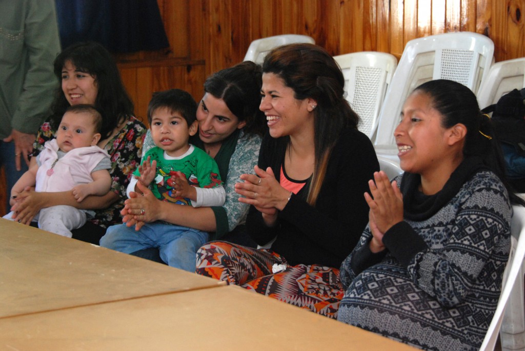 Young mothers gather in late October at Immaculate Heart of Mary Parish in Buenos Aires, Argentina, to discuss with Gravida volunteers topics ranging from diaper changes and pacifiers, to going out to dance for the first time since the birth of their baby. Gravida is an organization that supports pregnant women and young mothers. PHOTO: CNS/Enrique Cangas