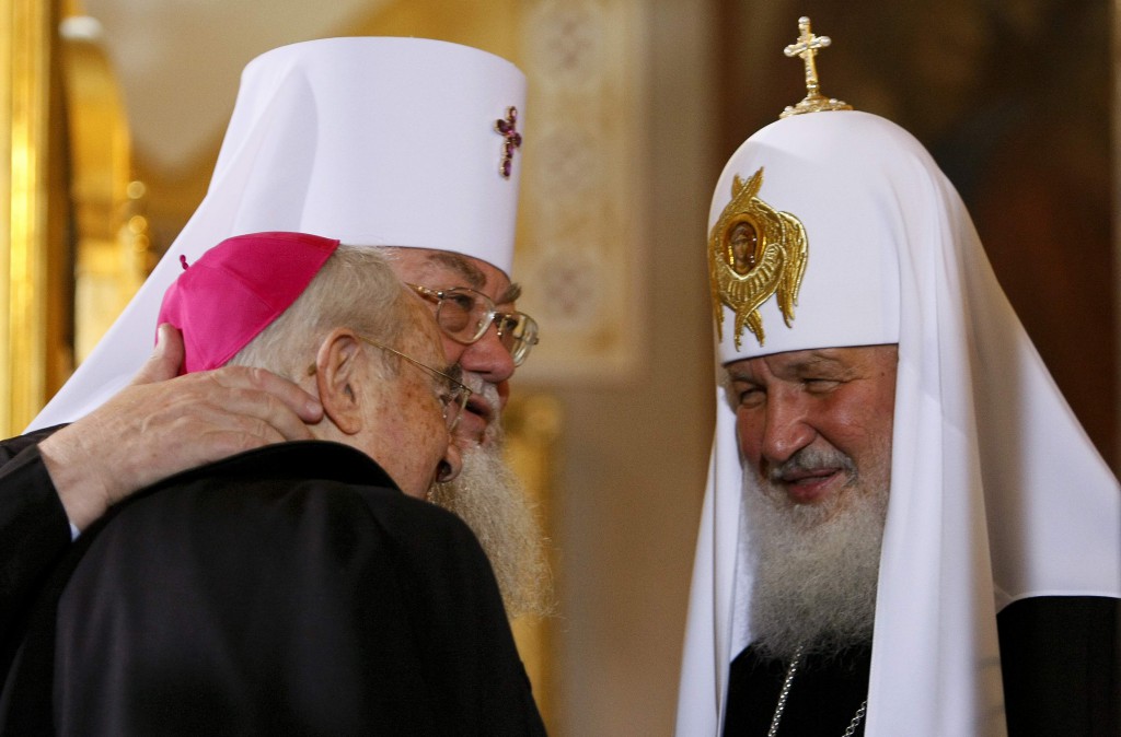 Russian Orthodox Patriarch Kirill of Moscow, right, and Metropolitan Sawa of the Polish Orthodox Church greet a Catholic clergyman at St. Mary Magdalene Orthodox Cathedral in Warsaw Aug. 16. The head of the Russian Orthodox Church made a historic visit to Poland with a message of reconciliation. PHOTO: CNS/Kacper Pempel, Reuters