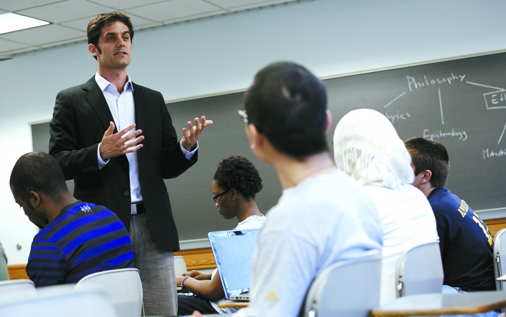 Franco Trivigno, associate professor of philosophy at Marquette University, talks to students in Milwaukee in late April at a time when the Obama administration was discussing linking funding inversely to performance indicators. PHOTO: CNS/courtesy Marquette University