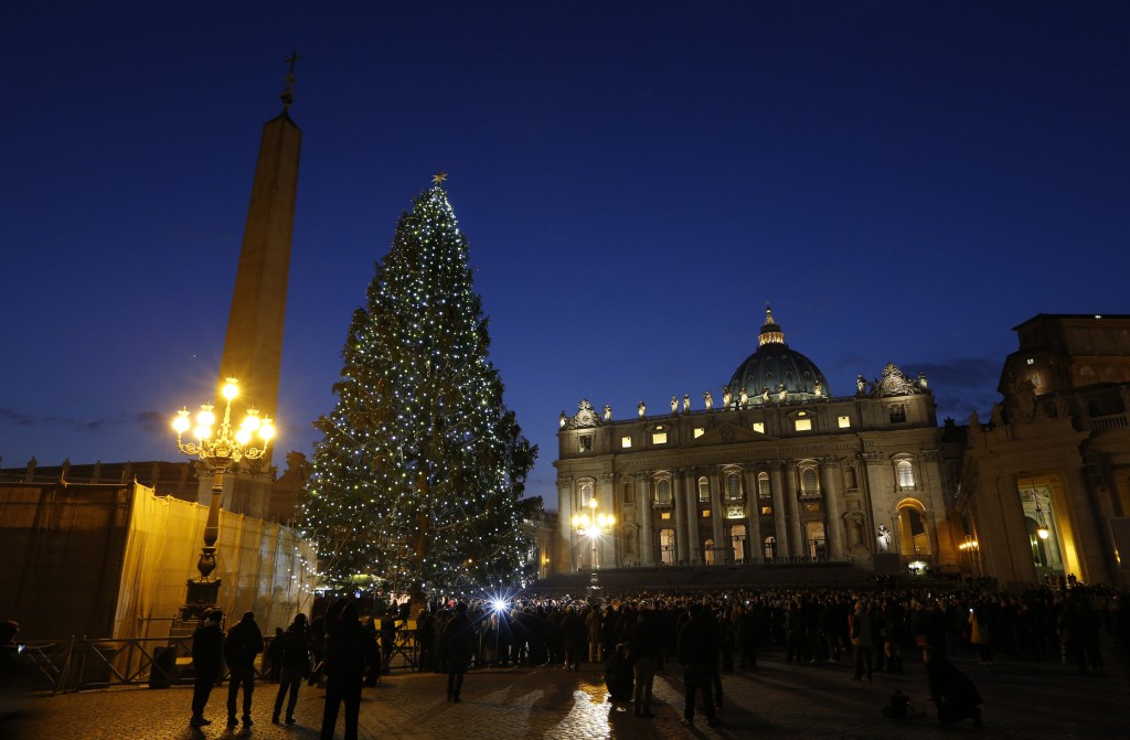 The Vatican Christmas tree glows after a lighting ceremony on Dec. 13 in St. Peter's Square. PHOTO: CNS/Paul Haring