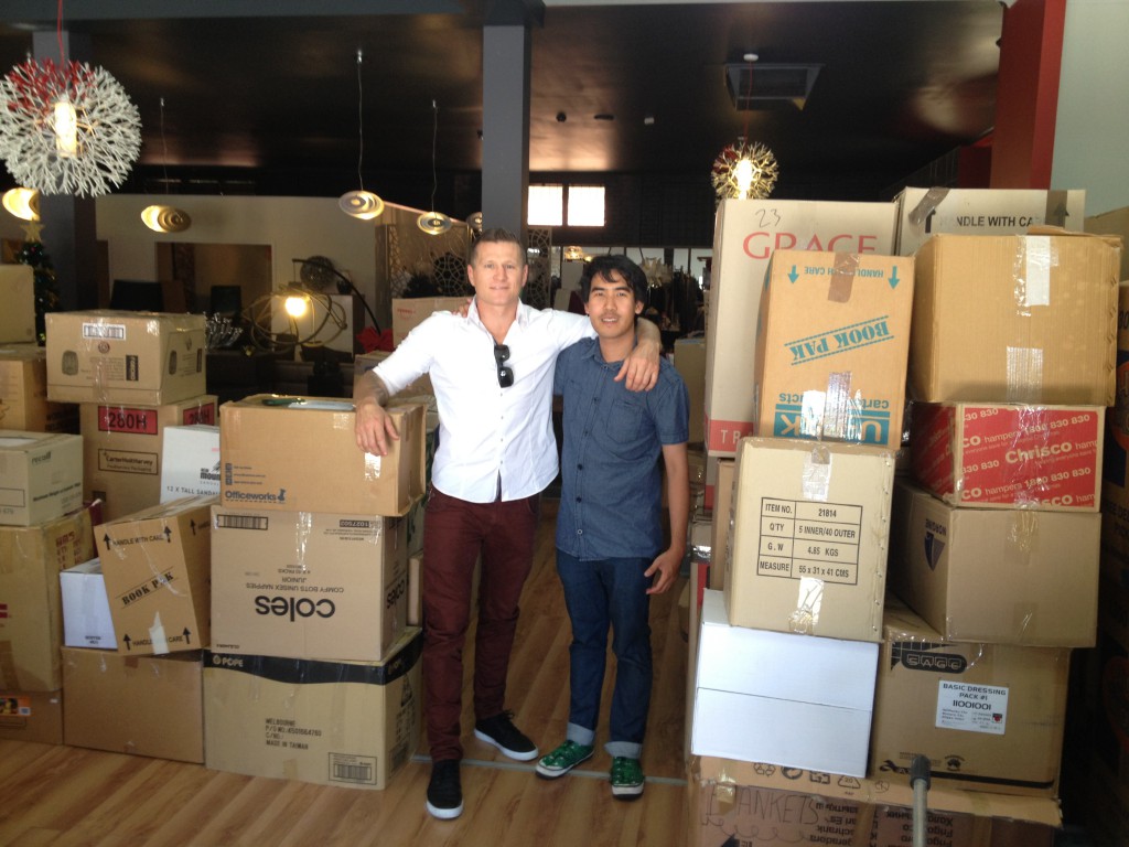 Perth boxer Danny Green with Michael Soh from Buckets for Jesus. The team received an overwhelming amount of donations from generous Catholics in response to Typhoon Haiyan.