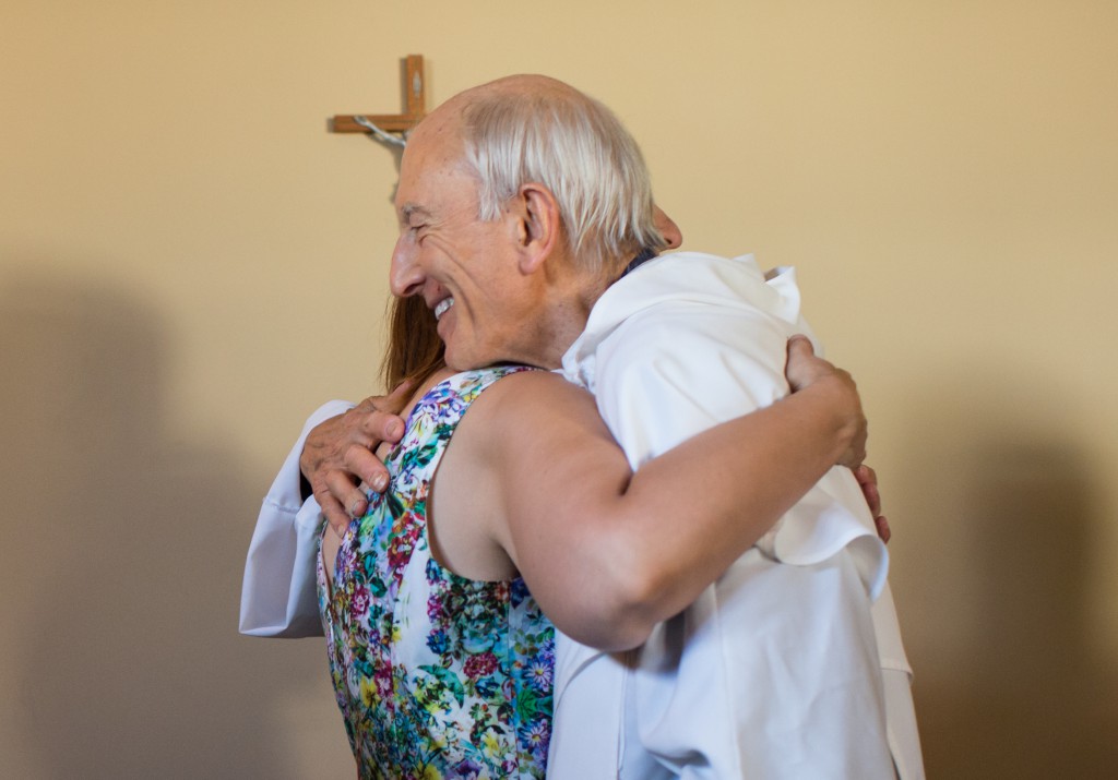 Fr Anthony Van Dyke OP says goodbye to one of his many young adult Catholic friends as he prepares to relocate to North Adelaide. PHOTO: Miller Lo