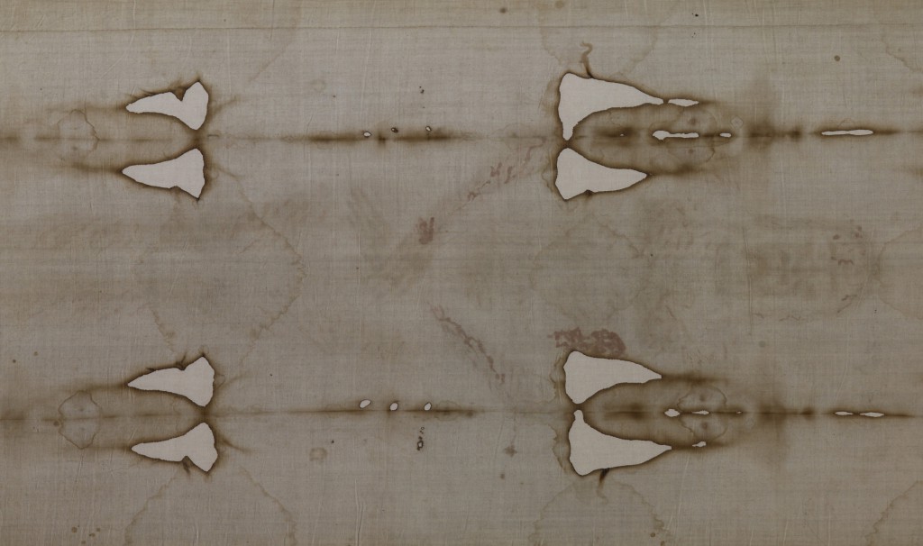 The Shroud of Turin is seen on display in the Cathedral of St. John the Baptist in Turin, Italy, in this 2010 file photo. The Archdiocese of Turin, custodian of the shroud, has announced that the shroud, venerated by many as the burial cloth of Christ, will be on public display April 19-June 24, 2015. PHOTO: CNS/Paul Haring