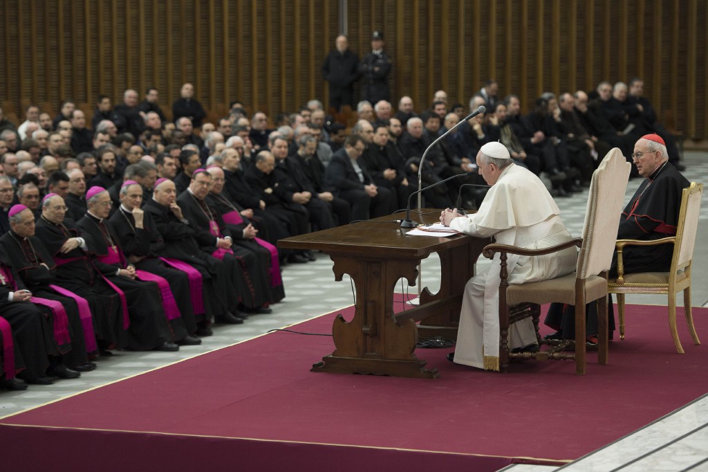 Prelates and priests look on as Pope Francis leads a meeting with priests in Paul VI audience hall at the Vatican March 6. The pope's annual Lenten meeting with Rome pastors focused on the priest's call to be a minister of mercy. PHOTO: CNS/L'Osservatore Romano