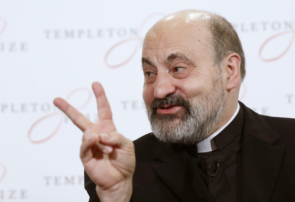 Msgr. Tomas Halik gestures during a news conference after being awarded the 2014 Templeton Prize in London March 13. Msgr. Halik, a Czech priest,  was honored for his work in promoting interfaith dialogue and understanding throughout the world. PHOTO: CNS/Oliva Harris, Reuters