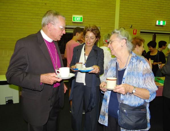 Above left, Anglican Bishop David Murray in conversation at an ecumenical Focolare event on March 14. 