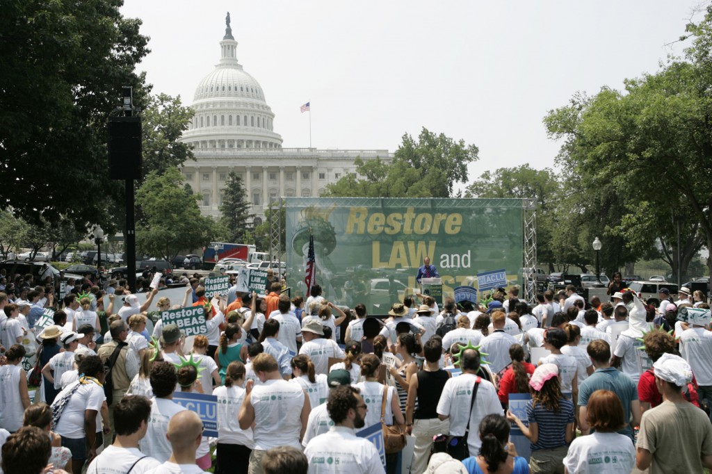 People gather during the "Day of Action to Restore Law and Justice" rally on June 26, 2007 in front of the U.S. Capitol in Washington. PHOTO: CNS/Bob Roller