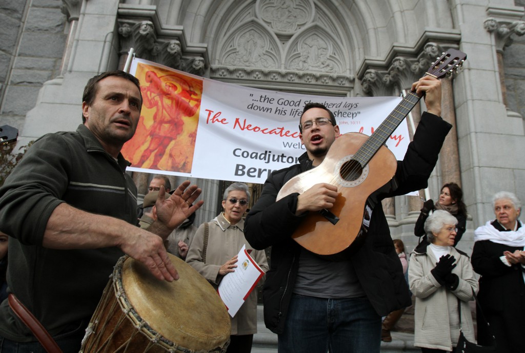 Members of the Neocatechumenal Way sing and play instruments outside the Cathedral Basilica of the Sacred Heart in Newark, N.J., Nov. 5 2013 before the Mass of welcome for Coadjutor Archbishop Bernard A. Hebda of Newark. PHOTO: CNS/Gregory A. Shemitz