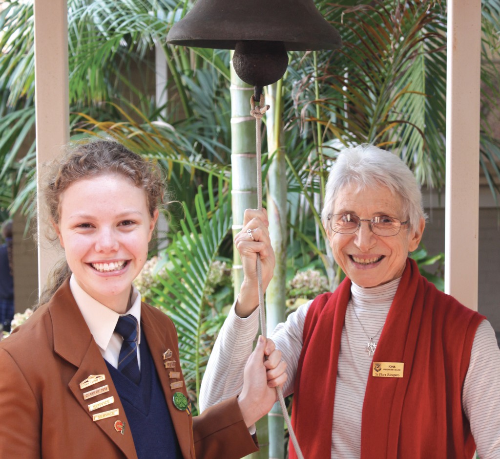 Liturgy captain Rebecca Hicks with Sr Flora Ricupero preparing to ring the Angelus bell at Iona Presentation College.