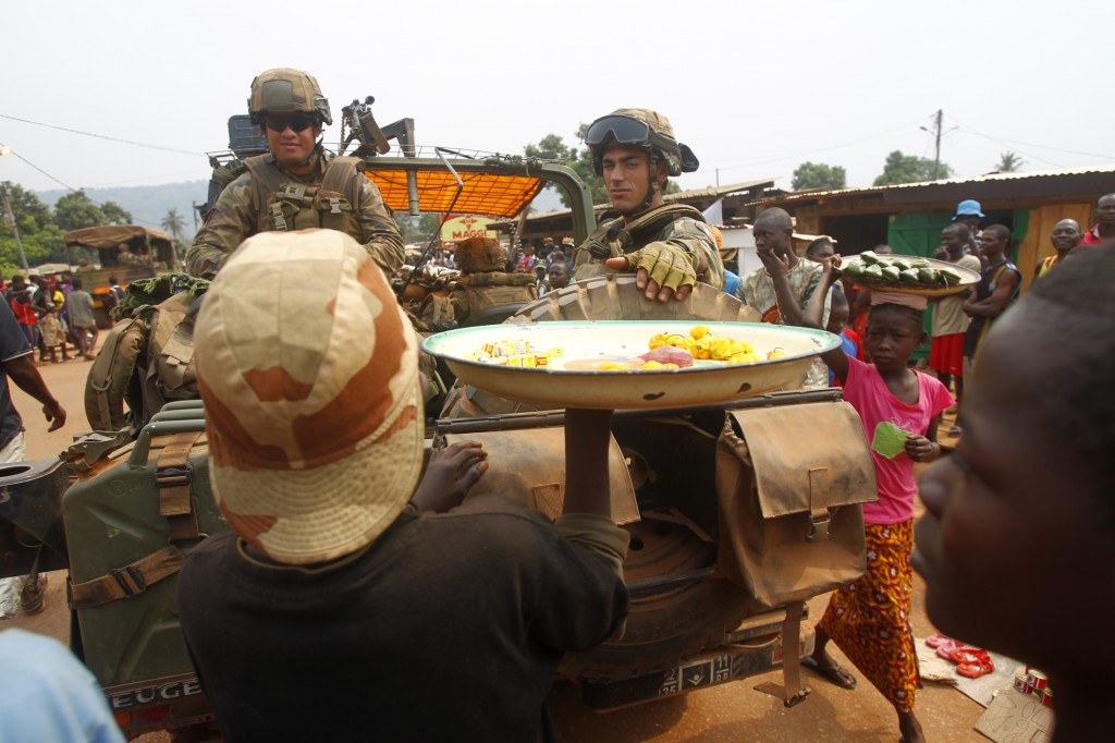 French troops lead a disarmament operation in Bangui, Central African Republic in February during what has been called a humanitarian crisis. The country's church leaders emphasized the need for healing from the trauma people have experienced, said Bishop Richard E. Pates of Des Moines, Iowa, who visited South Sudan and the Central African Republic July 10-21. PHOTO: CNS photo/Legnan Koula, EPA